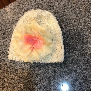 Newborn girl baby first photo hat rose flower